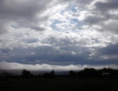 Cloud Darkness Over The Land Stock Photos