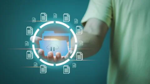 Cloud document management ,A young businessman holding an icon in his hand , Stock Photos
