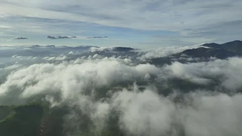 Cloud-Draped Peaks: Awe-Inspiring 4K Drone Journey in the Jungle's Mountains Stock Footage 244475100