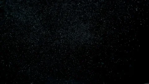 Cloud of dust floating in the air, shallow focus, bokeh, isolated on black Video stock 70981667