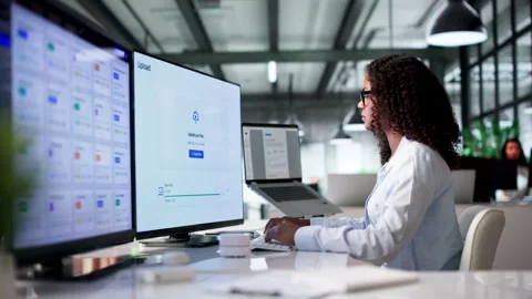 Cloud Engineer Carefully Uploads Secure Data Files Stock Footage 340405988