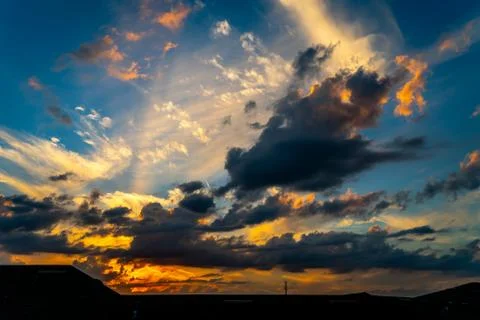 Cloud Filled Sunset Stock Photos
