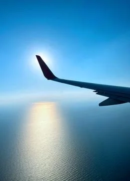 Cloud flight sky, cloud airplane sun sky blue air travel wing Stock Photos