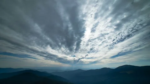 The cloud flow above picturesque mountains. time lapse Stock Footage 95210273