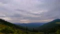 The cloud flow on the mountain background. time lapse 4k or 4k+ Resolution