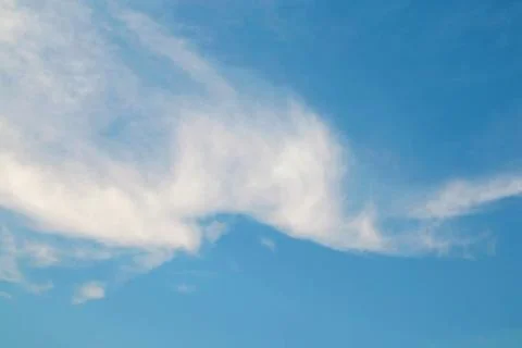 Cloud flow with wind in blue sky Stock Photos