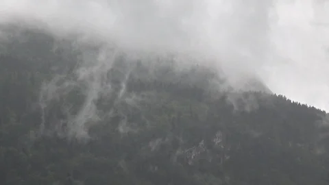 Cloud formation above forest hill Stock Footage 119905089