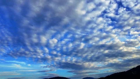 Cloud formation pans to mountains Stock Footage 312955973