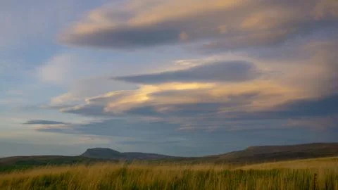 Cloud formations above the fell of Ingleborough in the Yorkshire Dales Stock Photos