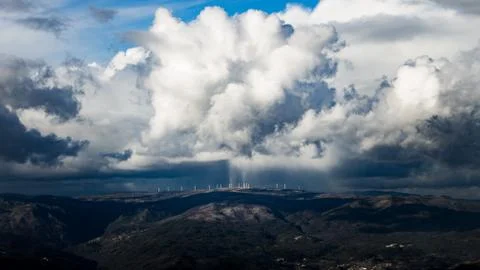 Cloud Formations Above Wind Turbines Stock Photos