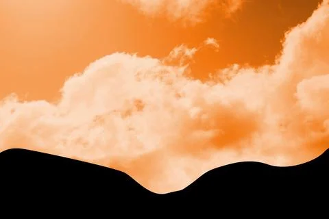 Cloud formations are drifting across flat design orange-tinted sky with black Stock Photos