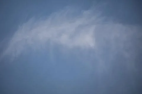 Cloud formations in the blue summer sky Stock-Fotos