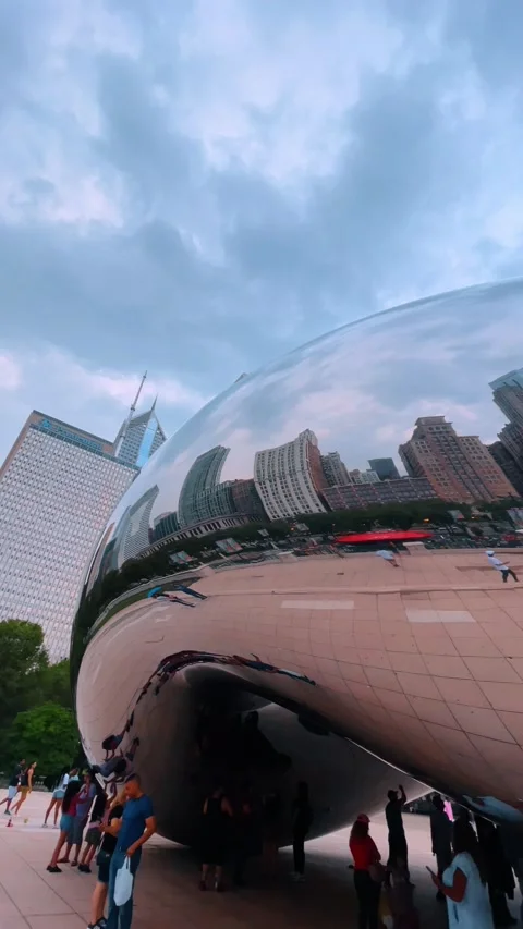 Cloud Gate sculpture reflection in Millennium Park Chicago Stock Footage 331600375