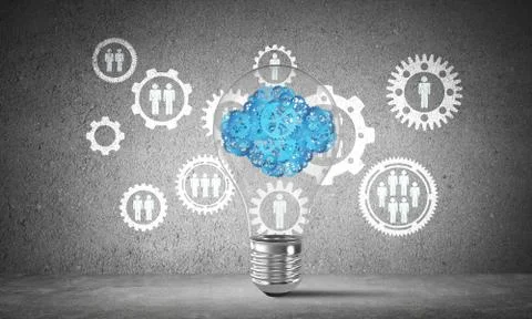 Cloud from gears inside lightbulb. Stock Photos