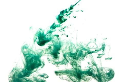 A cloud of green paint released into clear water. Isolate on a white backgrou Stock Photos