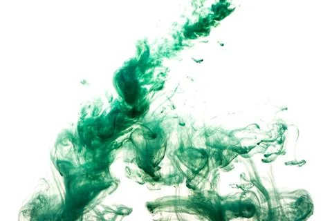 A cloud of green paint released into clear water. Isolate on a white backgrou Stock Photos