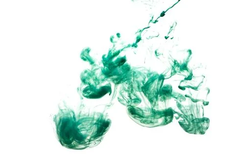 A cloud of green paint released into clear water. Isolate on a white backgrou Stock Photos