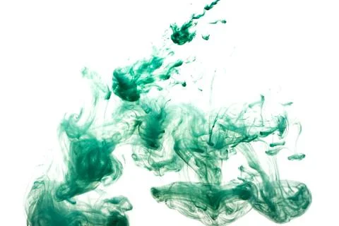 A cloud of green paint released into clear water. Isolate on a white backgrou Stock Photos