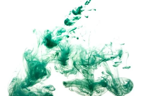 A cloud of green paint released into clear water. Isolate on a white backgrou Foto stock