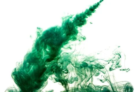 A cloud of green paint released into clear water. Isolate on a white backgrou Stock Photos