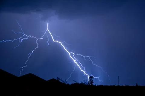 Cloud to Ground forked Lightning Strike Stock Photos