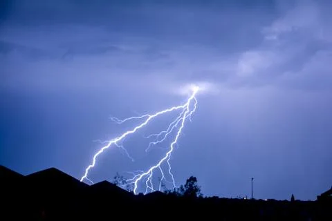 Cloud to Ground forked Lightning Strike Stock Photos