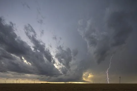 Cloud to ground lightning from a new Supercell stalled against an Outflow B.. Stock Photos
