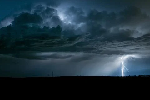 A cloud to ground lightning strikes from a severe Great Plains thunderstorm Stock Photos