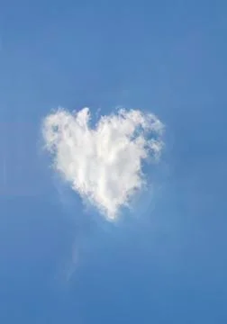 Cloud heart shape on clear blue sky Landscape Background Stock Photos