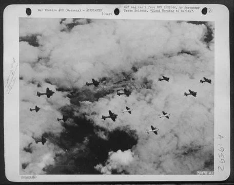 CLOUD HOPPING TO BERLIN: With breaks in the cloud banks below them affordi... Stock Photos