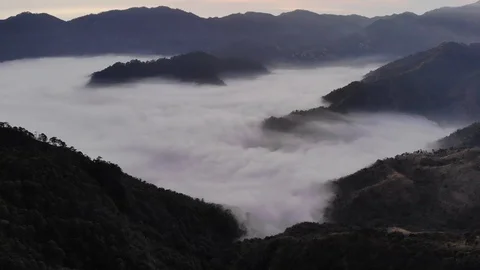 Cloud inversion in the mountains Stock Footage 124784758