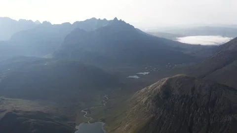 Cloud inversion over the rugged mountains on the Isle of Skye Stock Footage 310209306