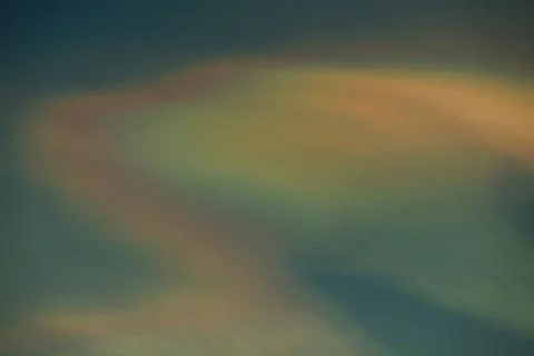 Cloud iridescence : diffraction phenomenon produce colorful clouds. Stock Photos