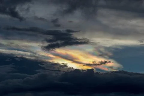 Cloud iridescence phenomenom at sunset over the central Andean mountains of C Stock-Fotos