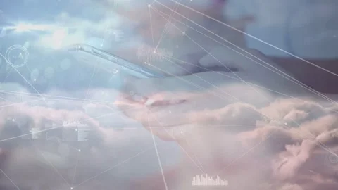 Cloud layer fading, hands holding phone rotating, tapping as data syncing, Stock Footage 334703025