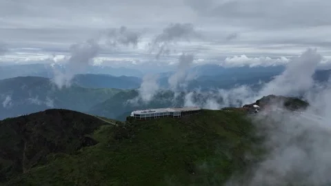 Cloud Layers Over Remote Mountain Wilderness in Niubeishan, China Stock Footage 344034463
