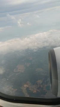 Cloud Layers Seen from Airplane Window Stock Photos