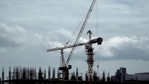 Cloud loop behind construction site, time lapse Stock Footage 115738366