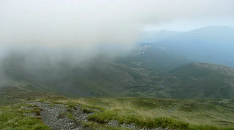 A cloud on the mountain top. Stock Footage 54682729
