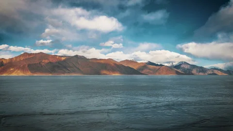Cloud movement over fully frozen  Pangong Lake , Ladakh, India Stock Footage 246748783