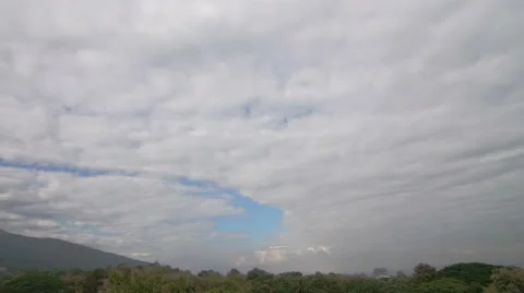 Cloud movement over the mountain in the evening Stock Footage 47269057