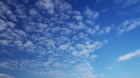 Cloud movement under the clear blue sky Stock Footage 47764211