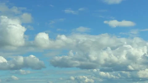 Cloud movements. Puffy fluffy white skies time lapse. Fast moving. timelapse Stock Footage 137134007