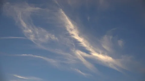 Cloud moves in a blue sky time lapse Stock Footage 107703922