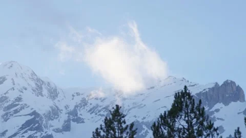 A cloud moves through the mountainous landscape of the Alps, in Switzerland Stock Footage 239733542