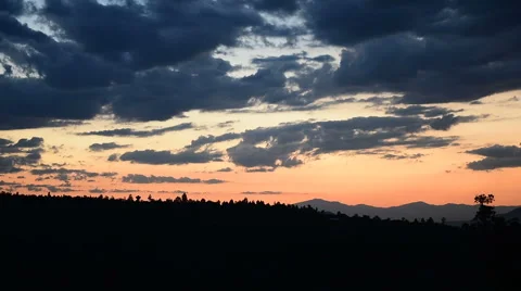 Cloud moving above the hills Stock Footage 64203375