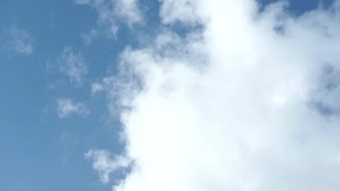 Cloud moving a clear sky day Stock Footage 221010770