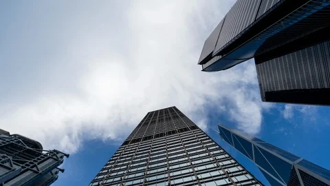 Cloud moving over sky scrapers Stock Footage 107091656