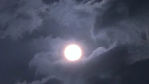 Cloud moving pass full moon and covering it Stock Footage 233361398