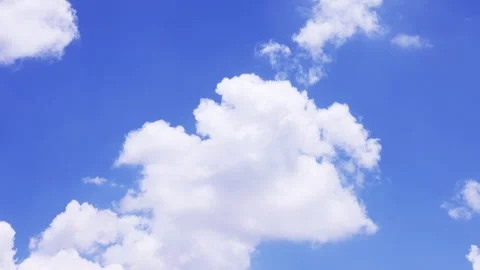 Cloud moving time lapse on a blue sky Stock Footage 292349338